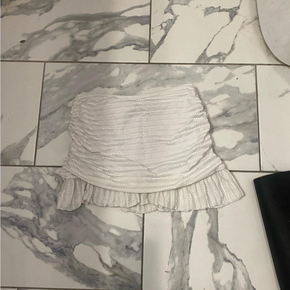 White mini skirt, hint of shimmer